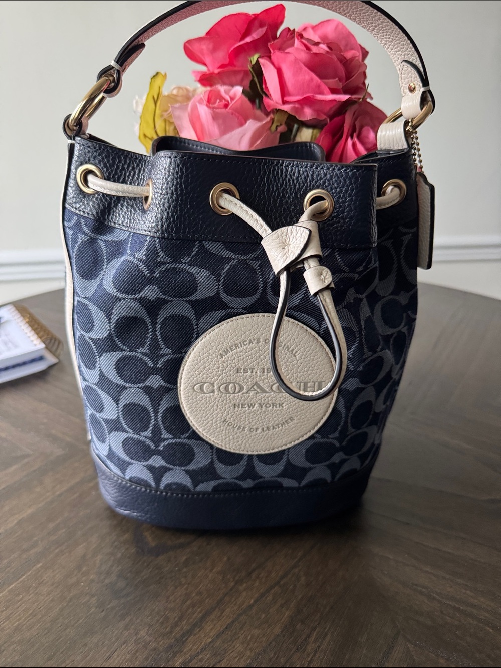 Coach Mini Signature Drawstring Bucket Bag in Navy and Cream